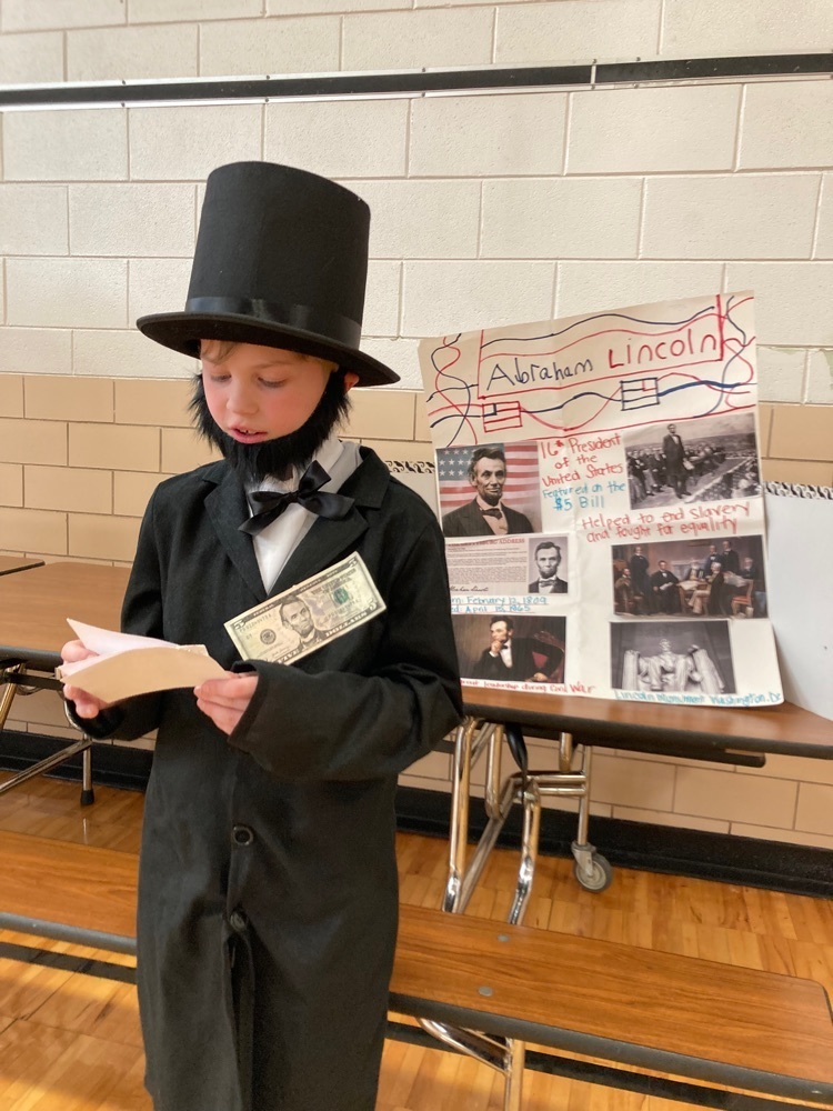 child dressed up as Abraham Lincoln 