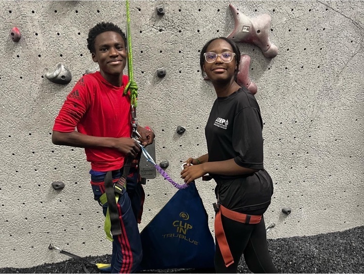 students getting ready to rock climb