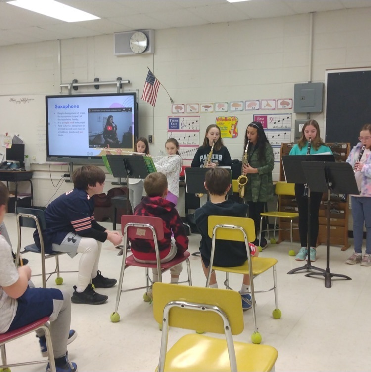 students playing saxophones 